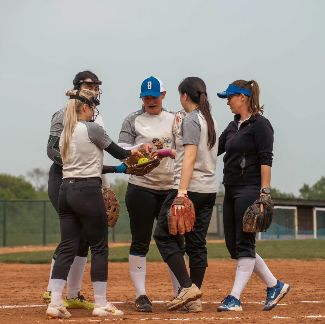 GBFL Barabarians huddle in the pitchers circle